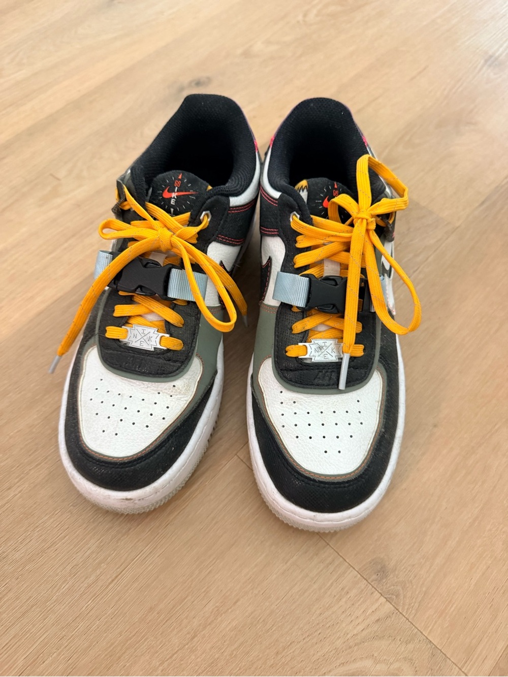 Nike White and Black Sneakers with Yellow Laces